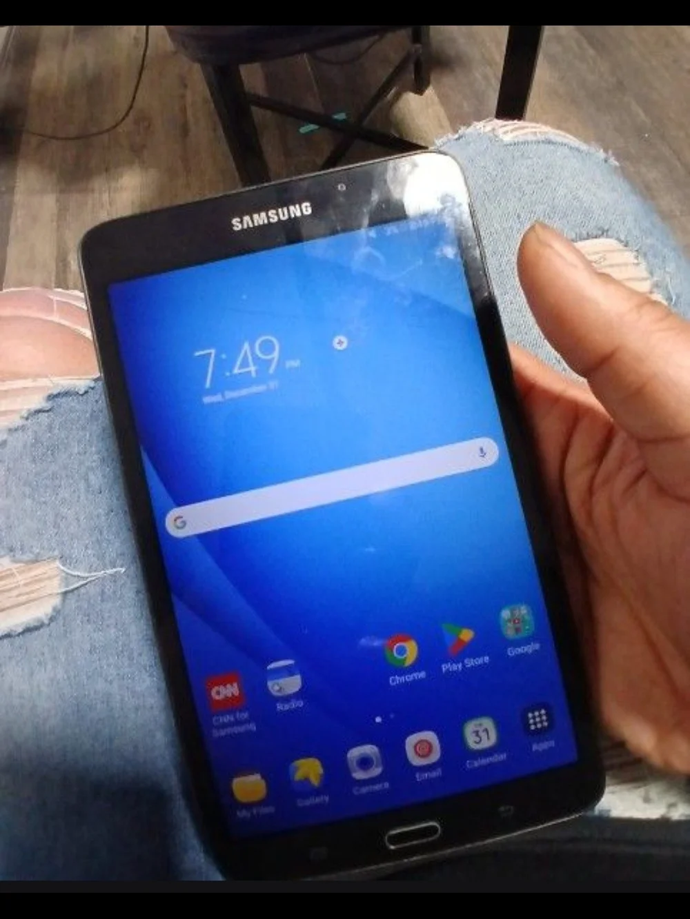 Samsung Black Tablet with Blue Display